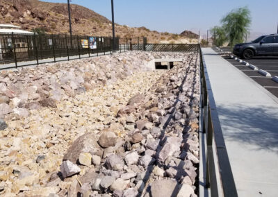 Landscape Drainage System made of rocks created for dog park by black canyon construction