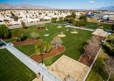 drone shot of woofter family par with dog runs and newly added trees and fresh landscaping