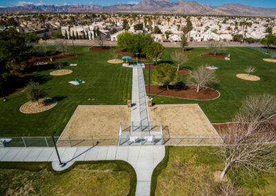 dog runs at woofter family park from overhead